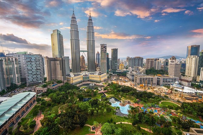 Aerial view of Kuala Lumpur's skyline, highlighting the city's modern educational institutions amidst its cultural landmarks, symbolizing a blend of tradition and modernity in education