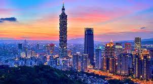 The bustling streets of Taipei with the iconic Taipei 101 in the background, symbolizing the city's modern educational facilities and rich cultural heritage